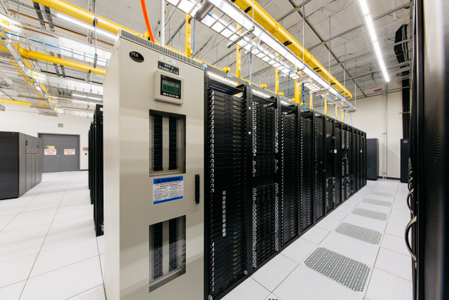 Rows of server cabinets inside a Hivelocity data center 