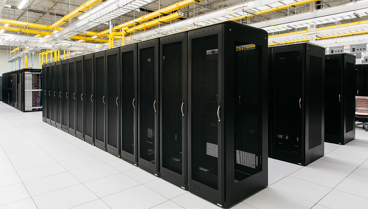 Rows of colocation server cabinets ready to be filled with dedicated servers