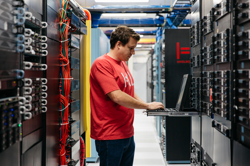 One of our highly trained and certified tech in our Tampa Data Center working on dedicated server power redundancy.